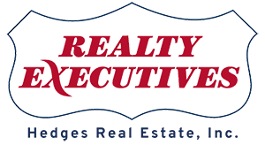 Realty Executives - Hedges real Estate, inc. Logo